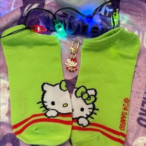 GREEN Hello Kitty Holiday crew socks and bag charm